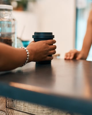 Refillable to go cup in a cafe