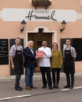 Michelin-starred chef Stefan Hummel in front of his restaurant Hummel. 