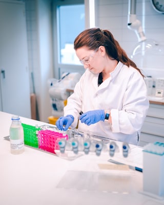 Lab technician examines the water values